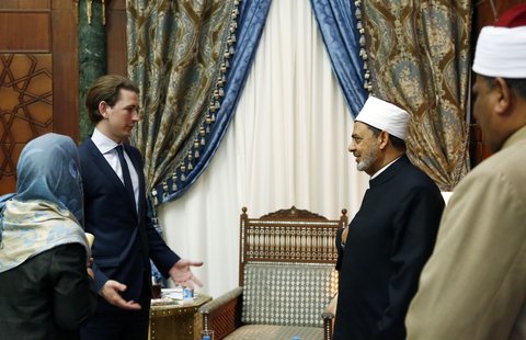 Grand Imam Ahmed el-Tayeb in formal Al-Azhar dress and turban, seated in an official meeting